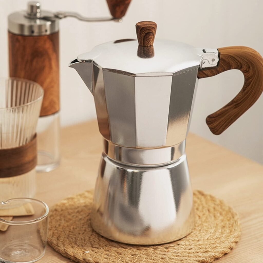 Coffee Grinder Moka Pot and coffee glass in the image showing brew help with Moka pot, how to brew coffee with moka pot