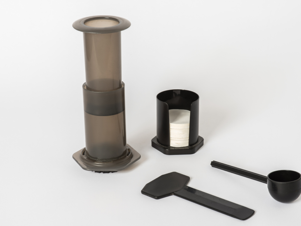 Aeropress Coffee Brew machine is shown in the image by five roam coffee, fiveroamcoffee
