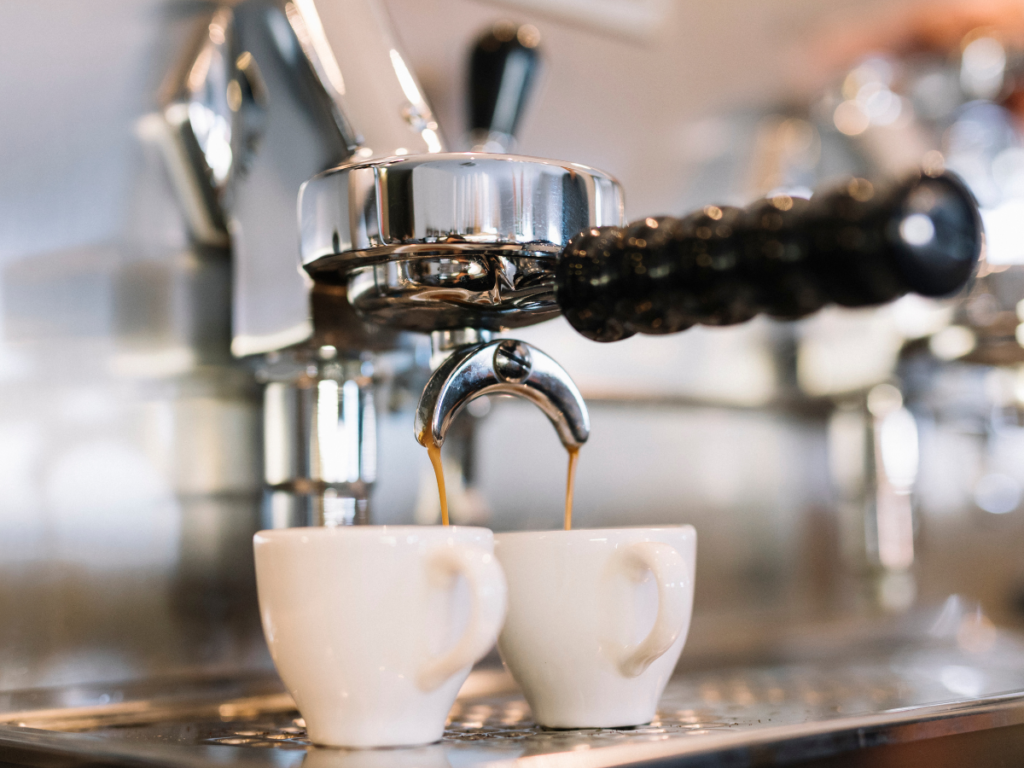 Espresso Machine Porta Filter is shown brewing coffee by five roam coffee brew help